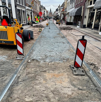 QMax en onderbed bestrating aanbrengen
